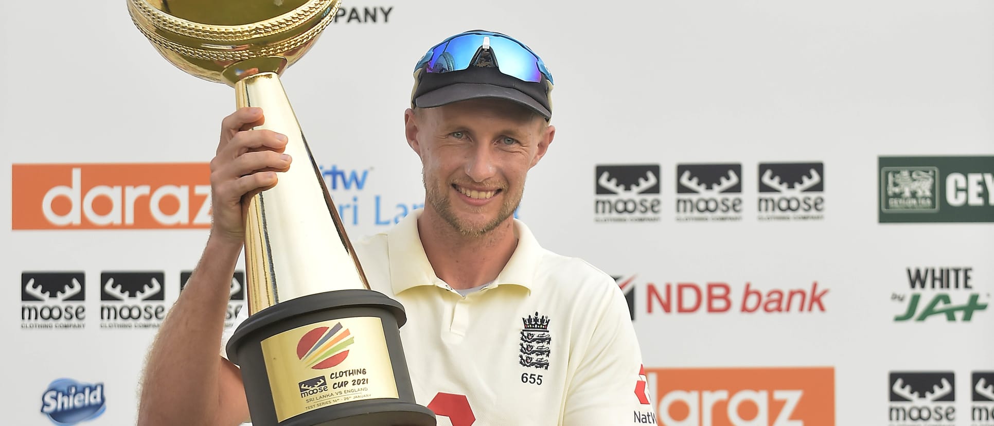 Joe Root, the England captain holds the 'Moose Clothing Cup 2021' trophy