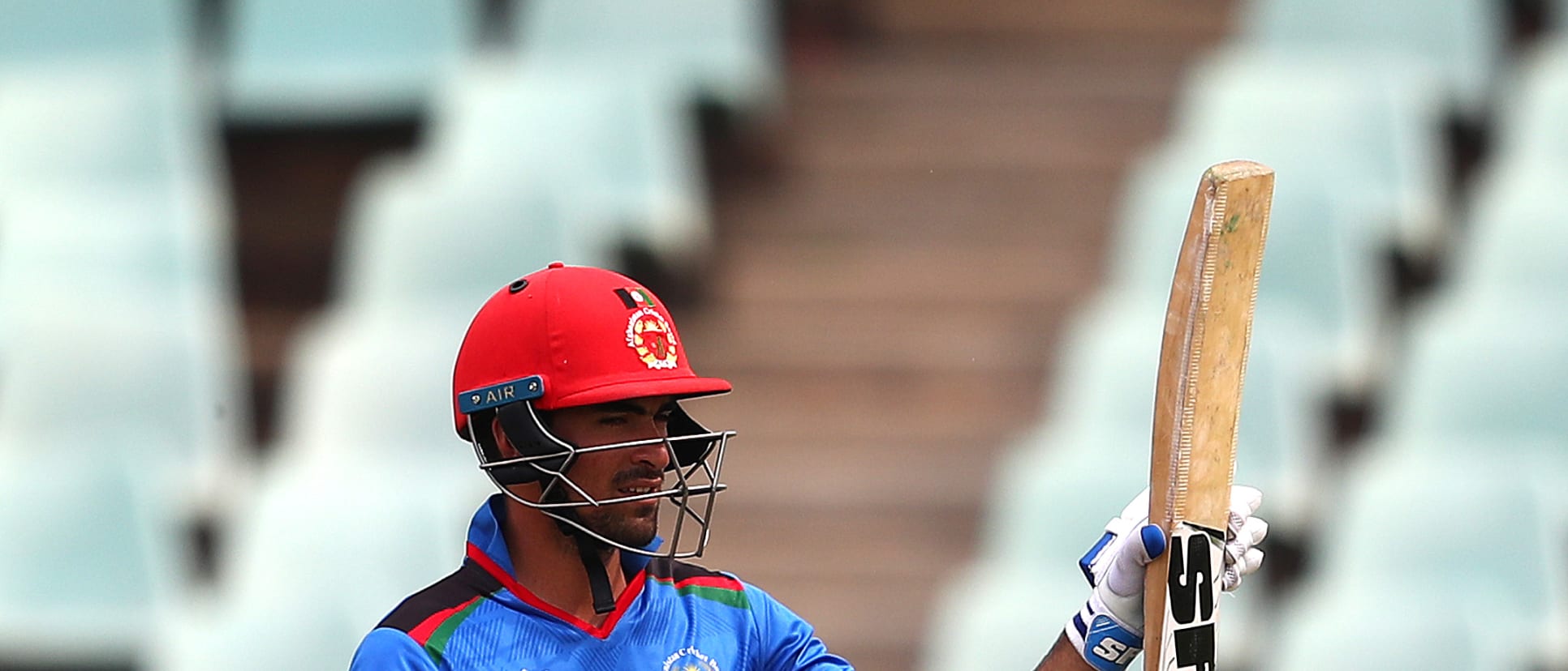 Ibrahim Zadran of Afghanistan celebrates his half century during the ICC U19 Cricket World Cup 7th Place Play-Off match between South Africa and Afghanistan at Willowmoore Park on February 05, 2020 in Benoni, South Africa.