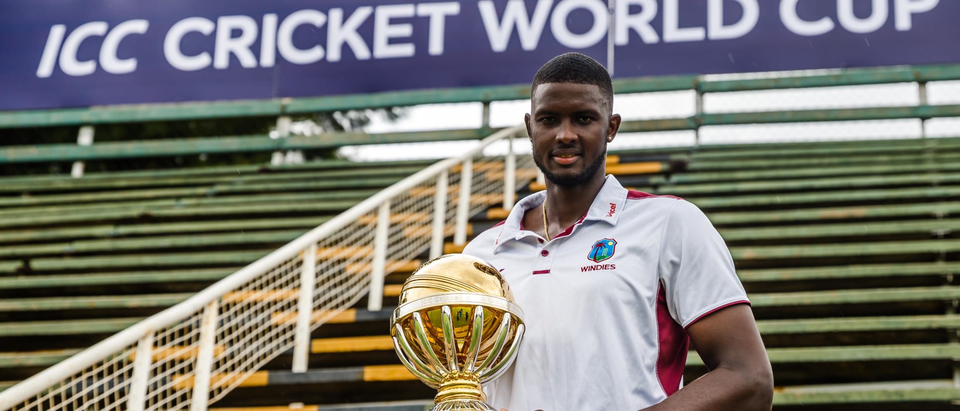 Jason Holder Windies captain holds the ICC World Cup trophy at Harare Sports Club ahead of the ICC Cricket World Cup Qualifier Trophy in Zimbabwe, 26 February 2018