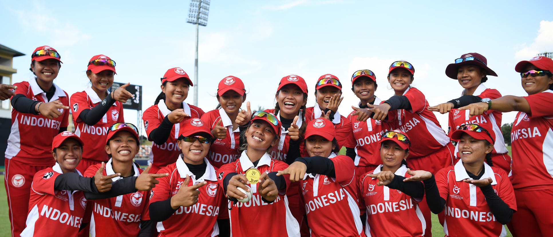 Ni Luh Ketut Dewi of Indonesia poses with the Player of the Match Award alongside their team mates following the ICC Women's U19 T20 World Cup 2023 4th place playoff match between Zimbabwe and USA at Willowmoore Park on January 20, 2023.