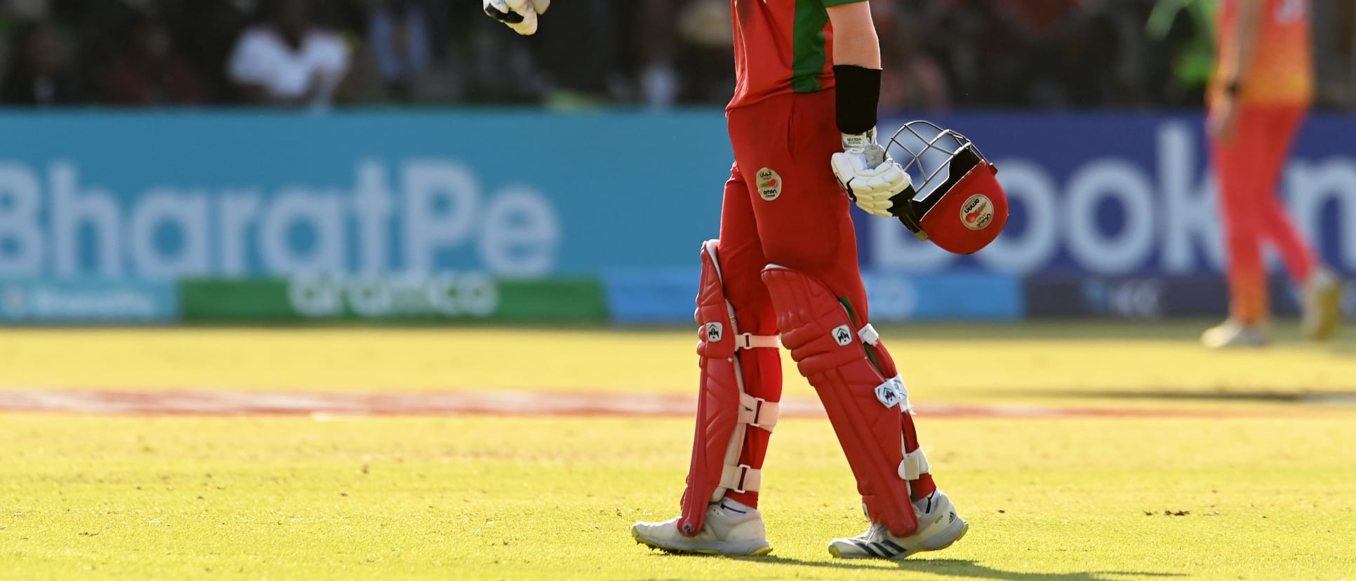 Kashyap Prajapati of Oman celebrates their century during the ICC Men's Cricket World Cup Qualifier Zimbabwe 2023 Super 6 match between Zimbabwe and Oman at Queen’s Sports Club on June 29, 2023 in Bulawayo, Zimbabwe.