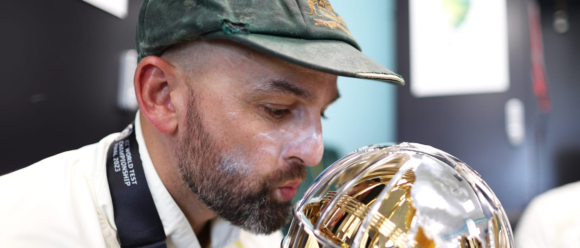 Nathan Lyon of Australia poses for a photo with the ICC World Test Championship Mace in the changing room on day five of the ICC World Test Championship Final between Australia and India