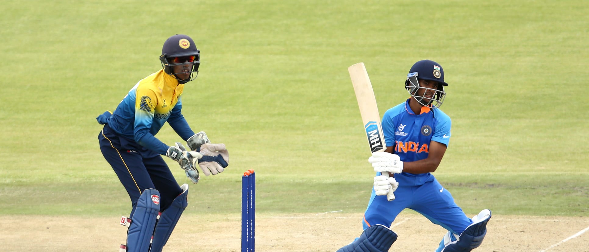 Siddhesh Veer of India bats with Kamil Mishara of Sri Lanka looking on during the ICC U19 Cricket World Cup Group A match between India and Sri Lanka at Mangaung Oval on January 19, 2020 in Bloemfontein, South Africa.