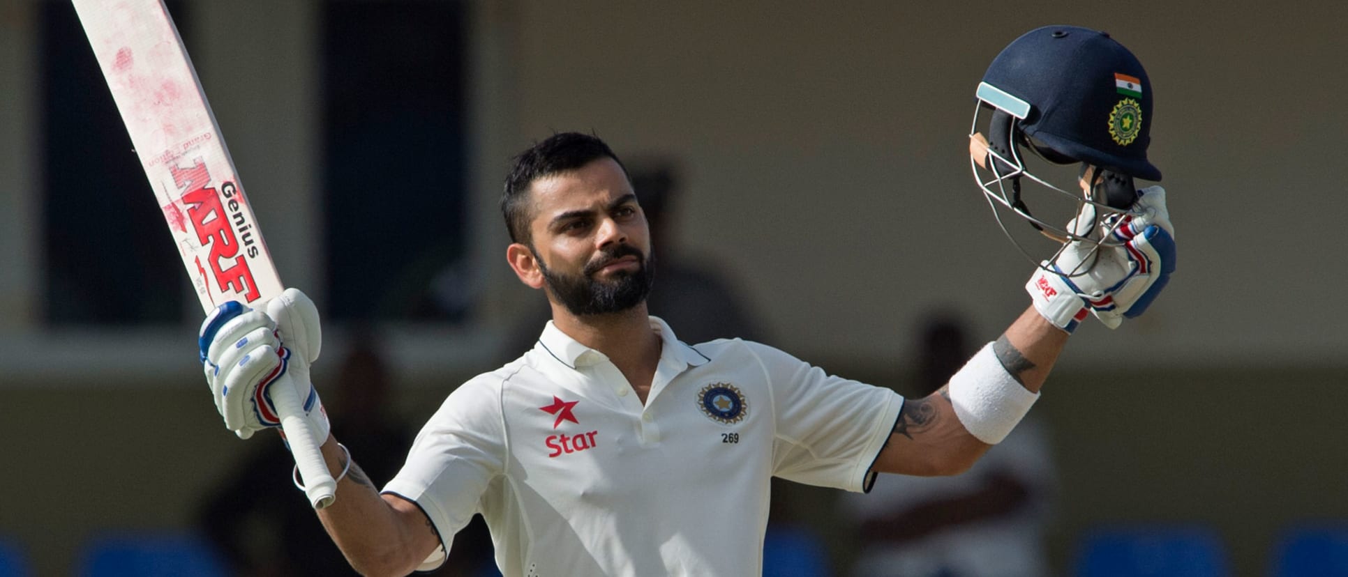 Kohli celebrates his milestone in Antigua // Getty Images