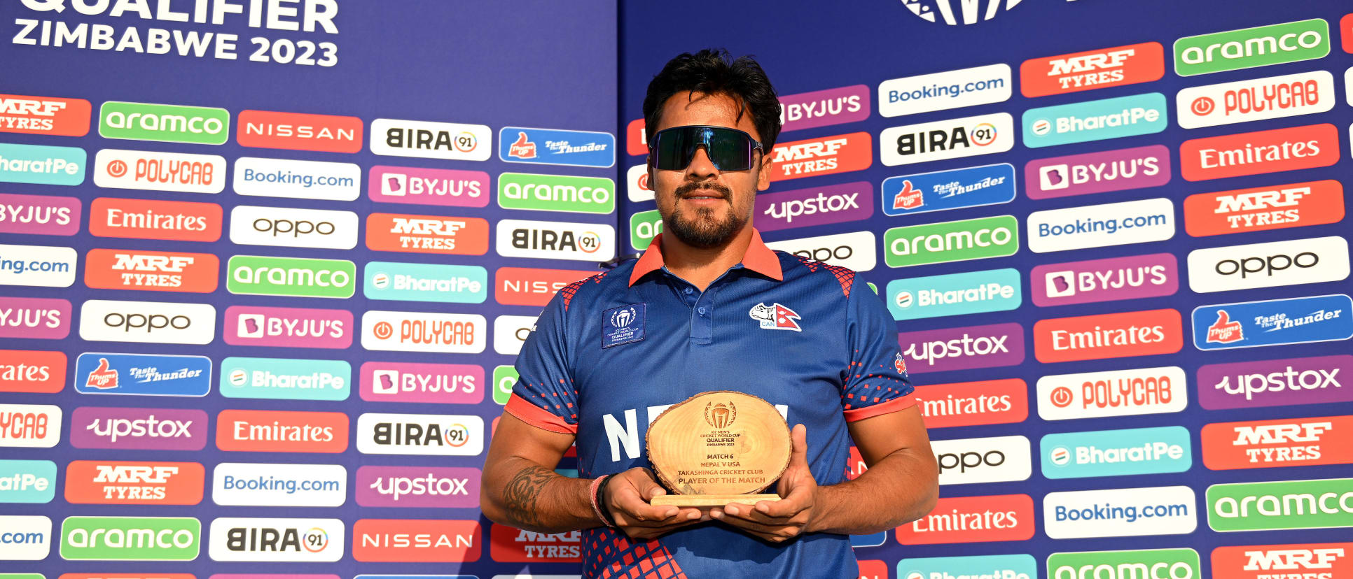 Karan KC of Nepal poses after being named Player of the Match following the ICC Men's Cricket World Cup Qualifier Zimbabwe 2023 match between Nepal and USA at Takashinga Cricket Club on June 20, 2023 in Harare, Zimbabwe.