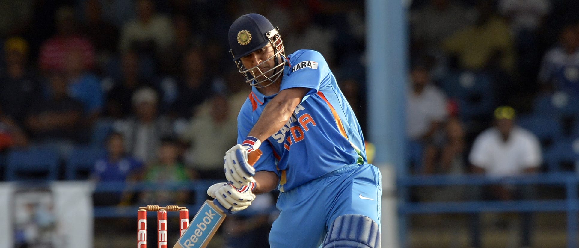 Dhoni hit two sixes and a four in the final over to complete a thrilling one-wicket win