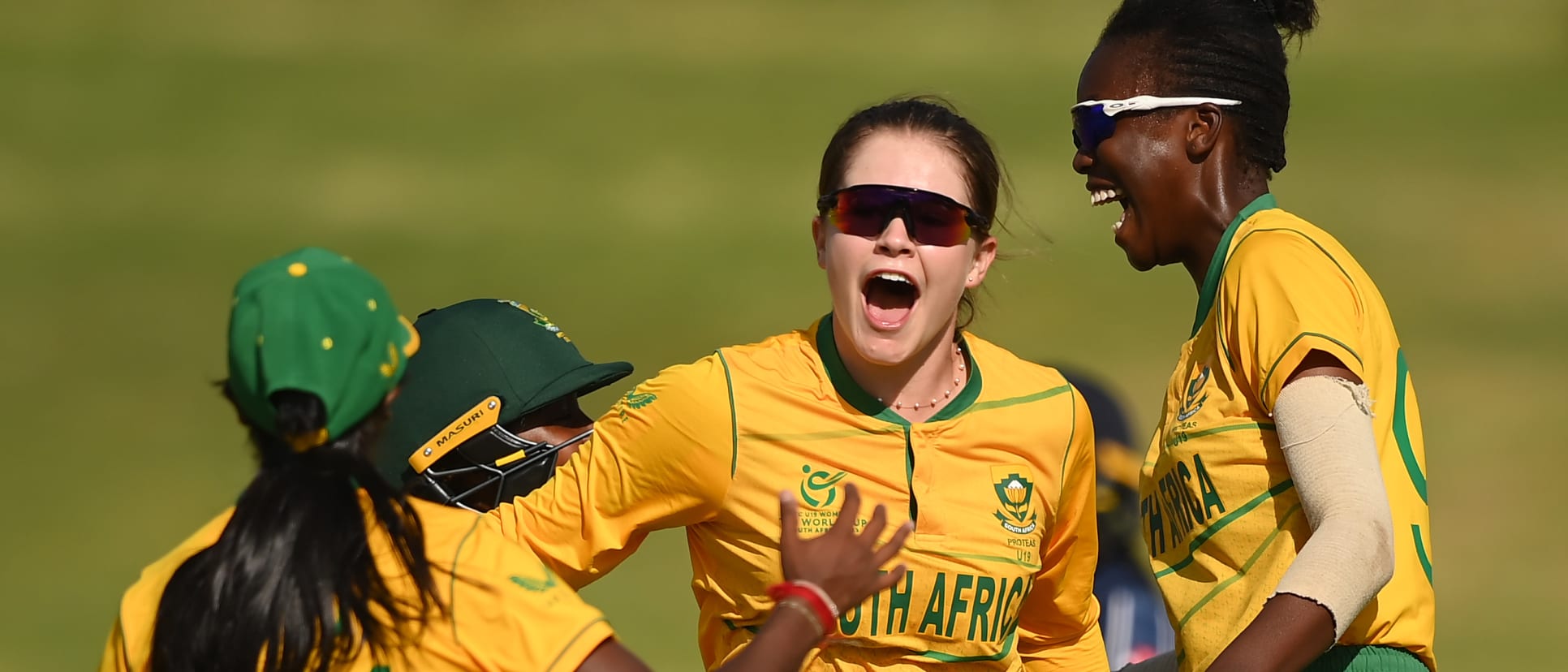 Madison Landsman of South Africa celebrates after taking the wicket of Orla Montgomery.