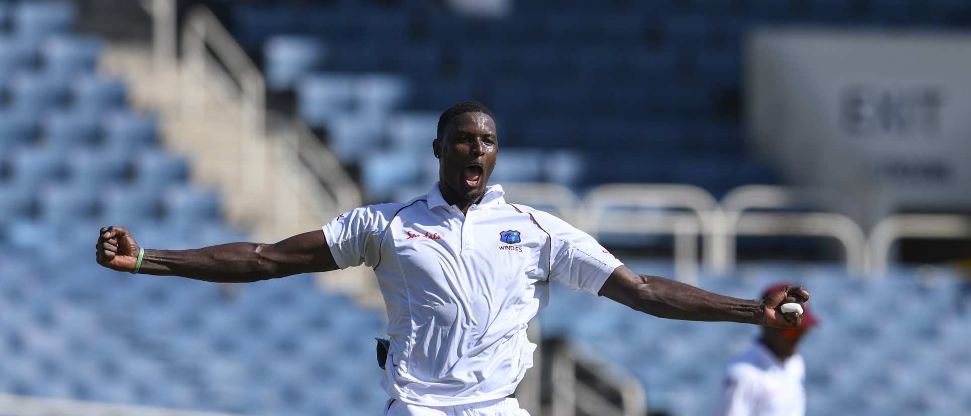 Jason Holder celebrates the wicket of Virat Kohli