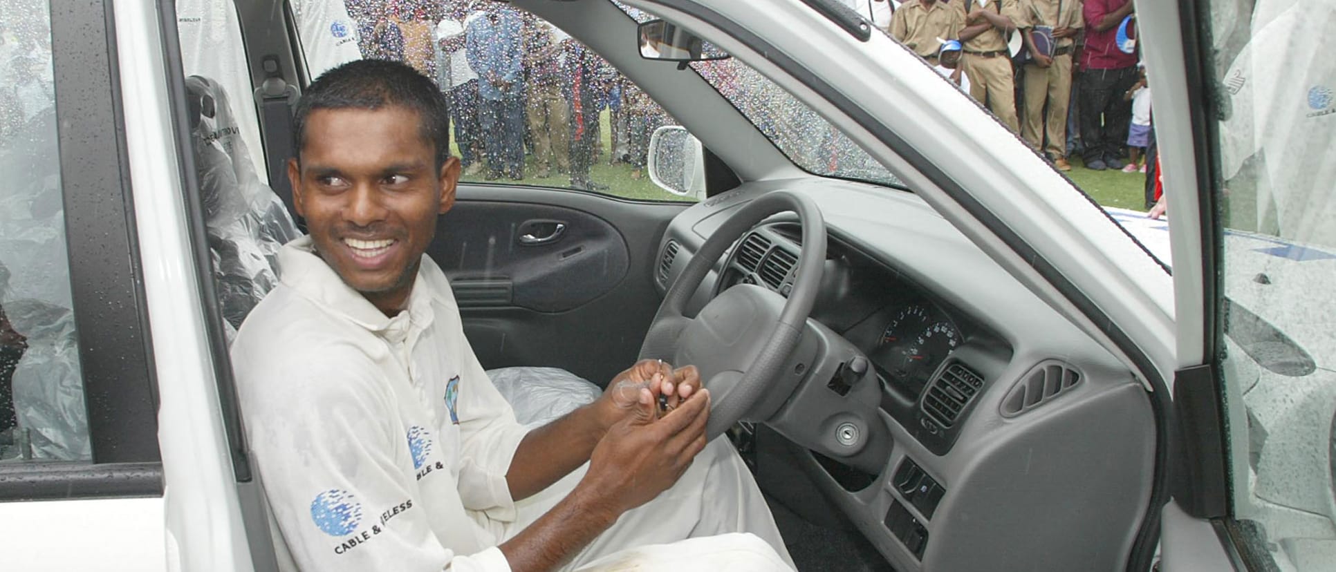 Chanderpaul is impressed with the new car he won for being player of the series in 2002 // Getty Images