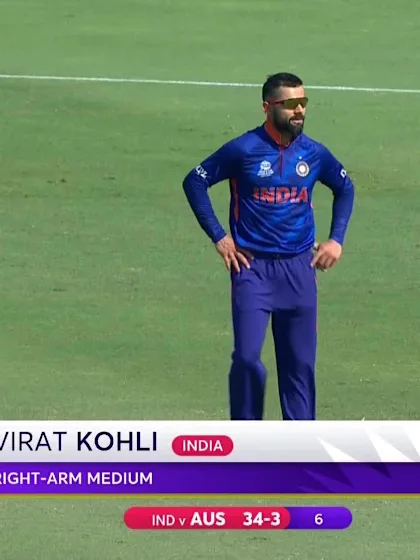 Virat Kohli rolls the arm over against Australia