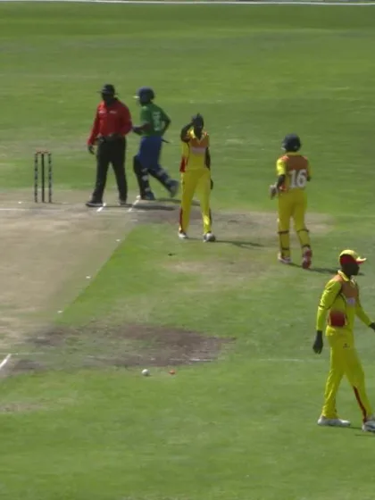 U19 CWC Africa Q: Uganda v Sierra Leone - Zephania Arinaitwe of Uganda runs out JF Bangura