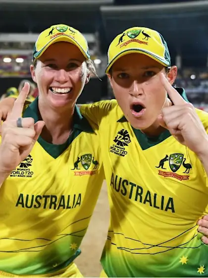Australia's players react in the immediate aftermath to their WT20 title win