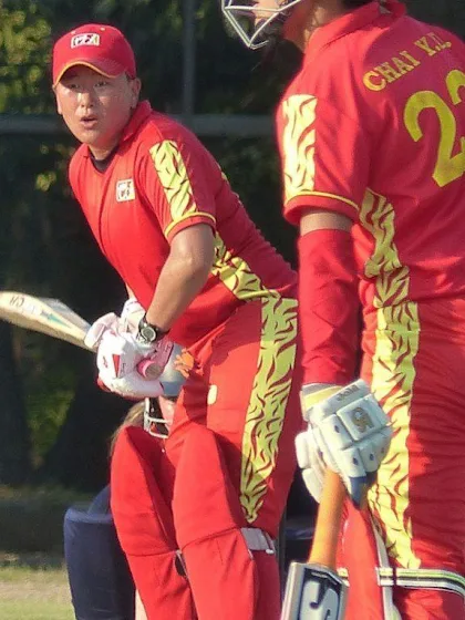 Keeping it simple, China's captain makes history