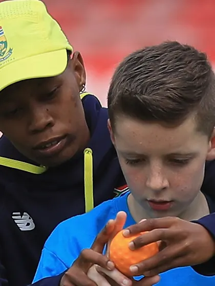 Luus and South Africa team-mates help put school children through their paces