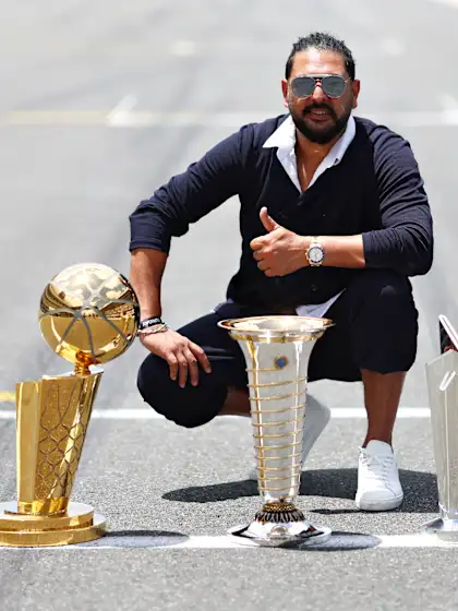 India legend Yuvraj Singh walks The Miami Grand Prix Grid with ICC Men’s T20 World Cup Trophy