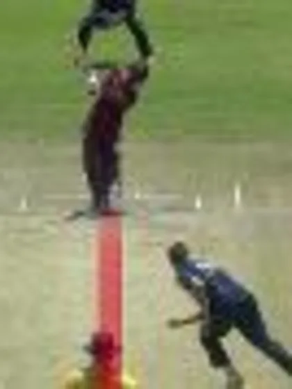Brad Wheal gets Evin Lewis lbw for 66