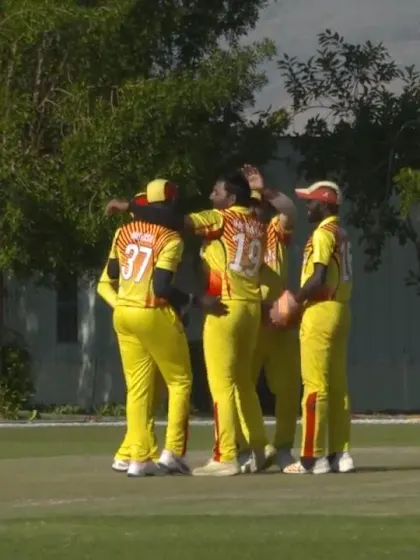 CWC Challenge League B – Oman: Uganda's Roger Mukasa takes a fine diving catch