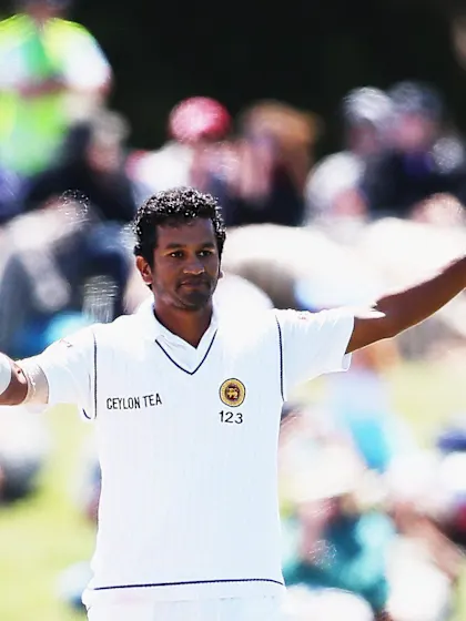 Karunaratne ton holds off New Zealand