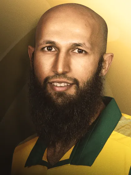 Logo of Hashim Amla: A rock in defence, blissful in attack
