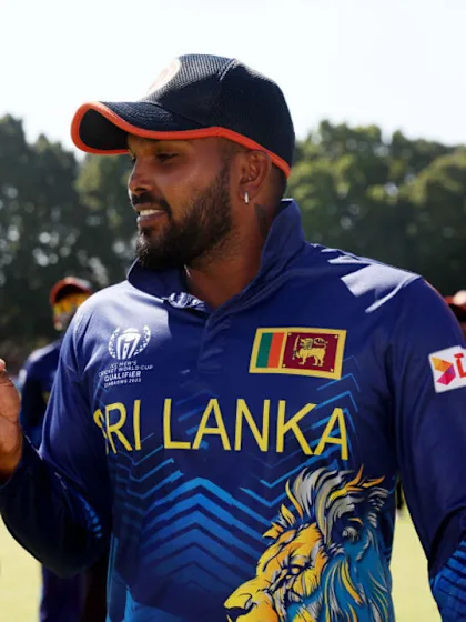 Logo of Hasaranga rips up Oman with career-best figures | CWC23 Qualifier