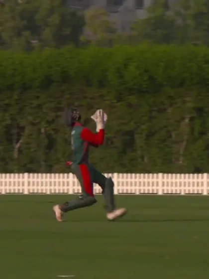 Logo of T20WCQ: KEN v BER – Wicketkeeper Irfan Karim takes a running catch