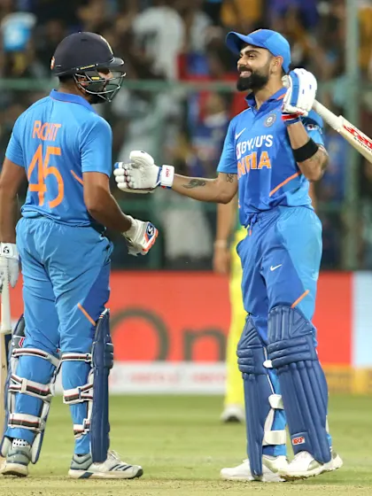 Kohli, Sharma consolidate positions, Dhawan moves up