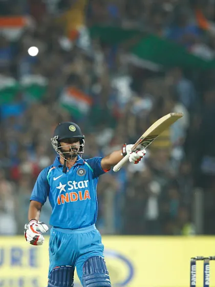 Kohli dazzles, Jadhav sparkles as India hunts down 350