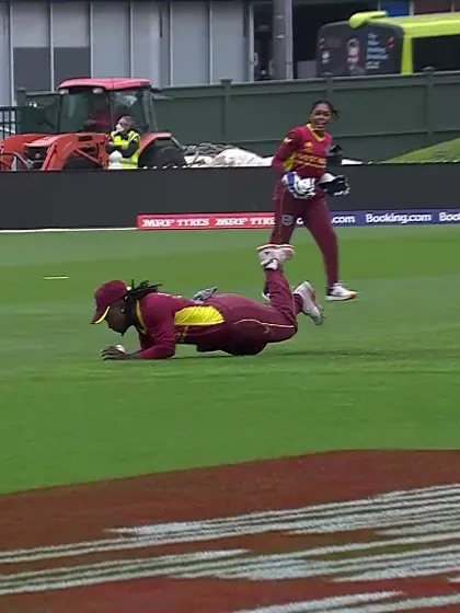 Logo of Deandra Dottin holds a stunning catch to remove Wolvaardt