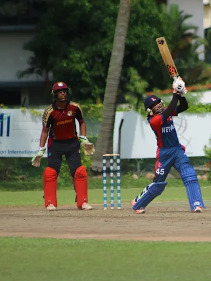 Afghan romp to fourth win as Nepal survive Singapore surge