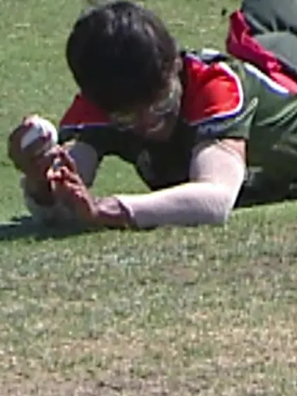 Logo of WICKET: Fletcher caught as Khatun dives to get fingertips under the ball