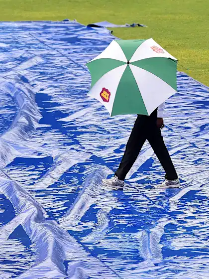 India works through top order on truncated day