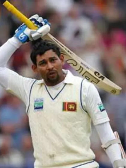 Sri Lanka's charge held up by rains