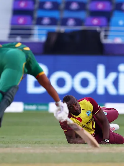 A bullet of a throw from Russell gets the wicket of Bavuma