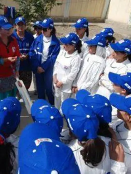 Girls in Kabul attend cricket camp