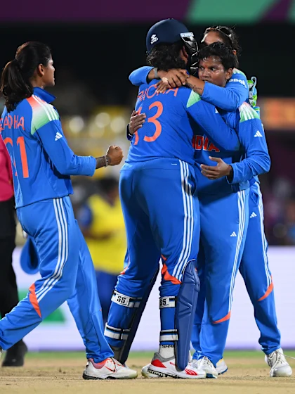 India battle to opening victory in front of record crowd