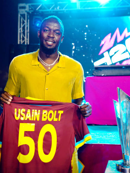 Usain Bolt with the ICC Men's T20 World Cup trophy