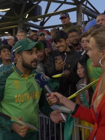 Elma Smit interacts with Tabraiz Shamsi and South Africa fans