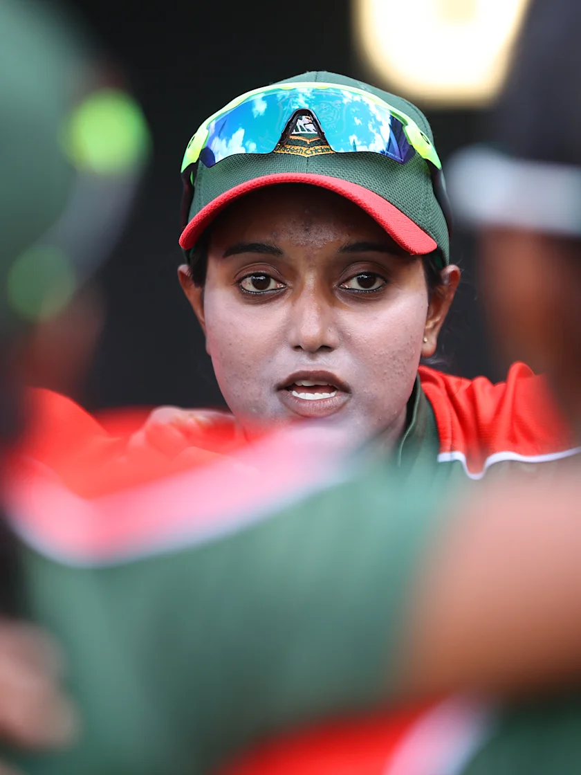 Logo of Bangladesh captain Nigar Sultana talks to her players before the 2022 ICC Women's Cricket World Cup match between India and Bangladesh at Seddon Park on March 22, 2022 in Hamilton, New Zealand.