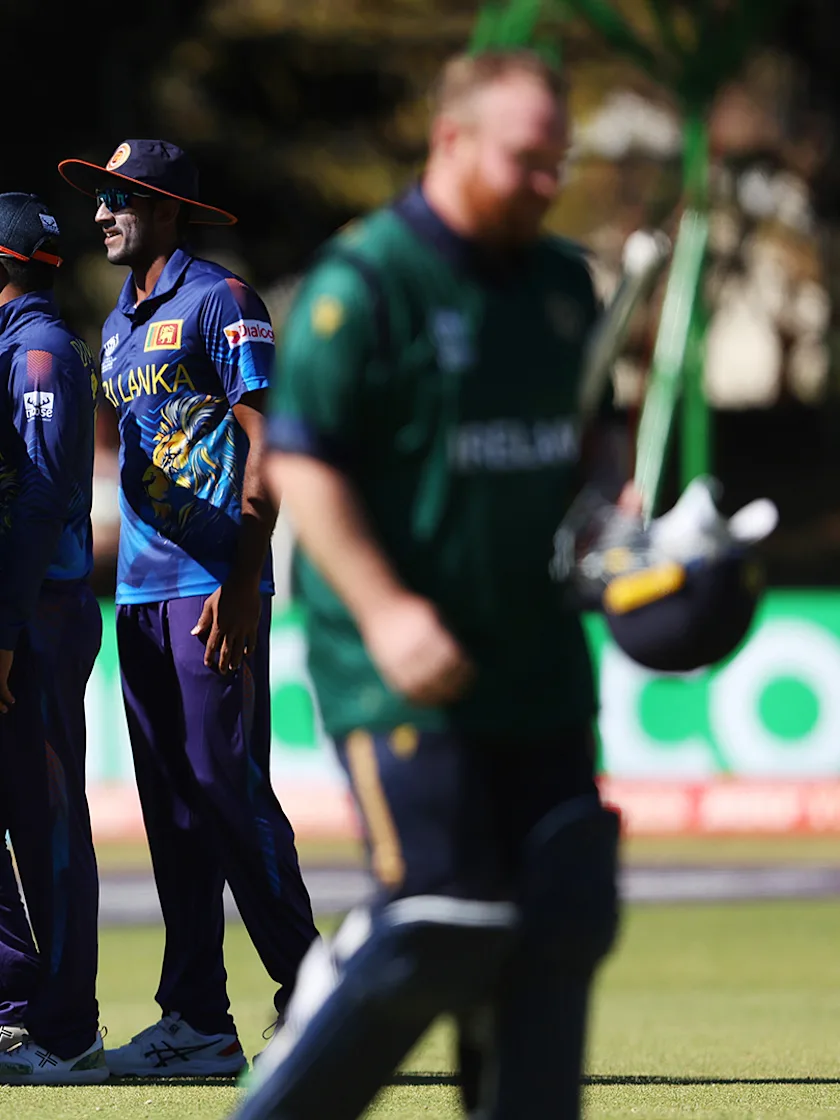 Logo of Lahiru Kumara of Sri Lanka celebrates dismissing Paul Stirling of Ireland during the ICC Men's Cricket World Cup Qualifier Sri Lanka and Ireland