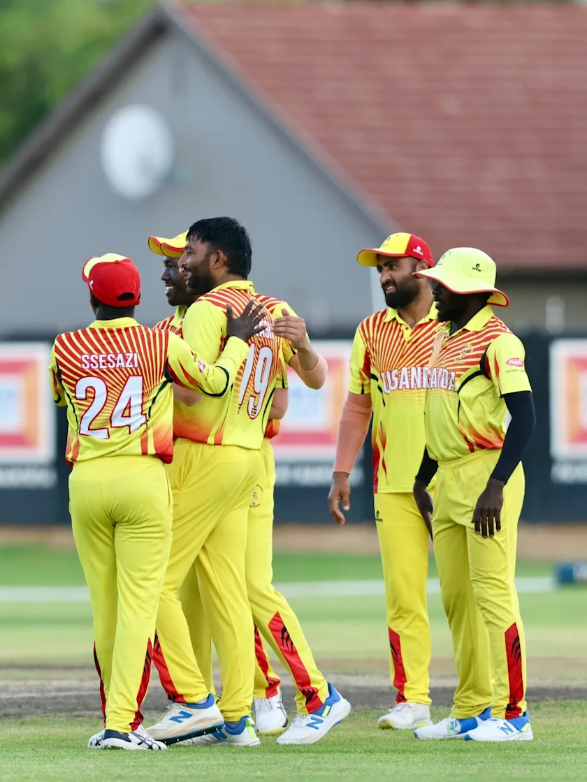 Logo of Uganda players celebrate.    *Picture Credit: Cricket Uganda