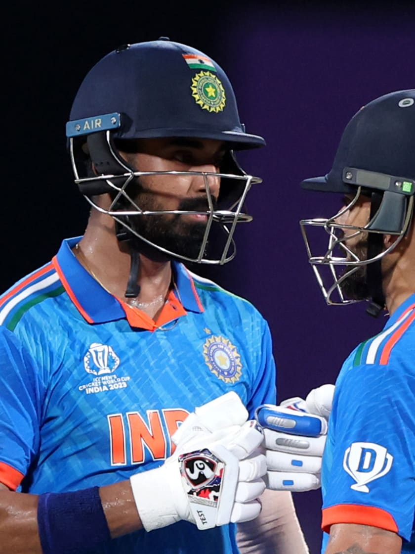 Virat Kohli (L) and KL Rahul of India interact during the ICC Men's Cricket World Cup India 2023 between India and Australia